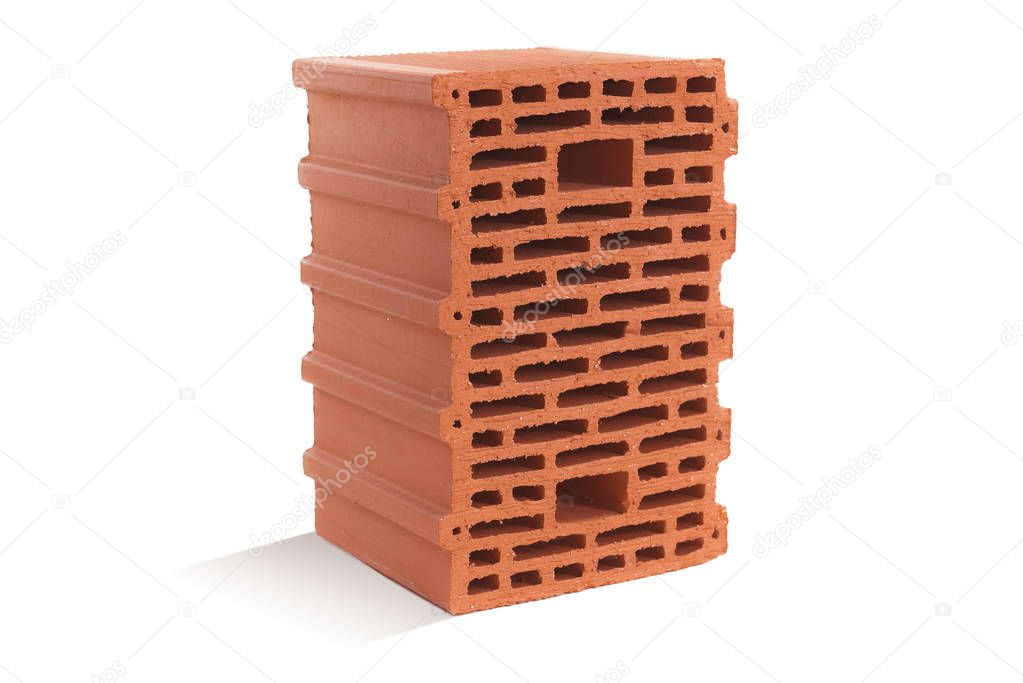 red brick (brick block) on a white background. Ceramic block of a new development in the construction sector.
