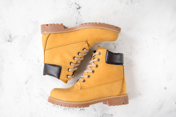 Women's winter boots. Yellow warm boots for trekking.