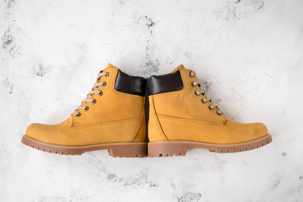 Women's winter boots. Yellow warm boots for trekking.