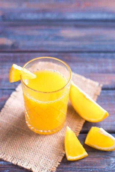 Fresh orange juice on the table,  rustic style — Stock Photo, Image