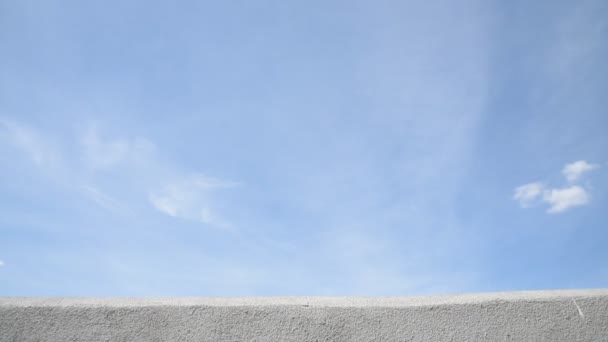 Crazy mime dance on the parapet with a tambourine against the sky. Funny clown antics. — Stock Footage Crazy Mime Dance Parapet Tambourine Sky Funny Clown Antics Royalty Free Stock Footage