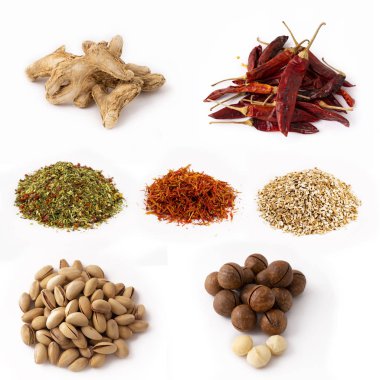 Macadamia cevizi, şam fıstığı, zencefil kökü, kırmızı biber, İtalyan otları, beyaz izole edilmiş safran..