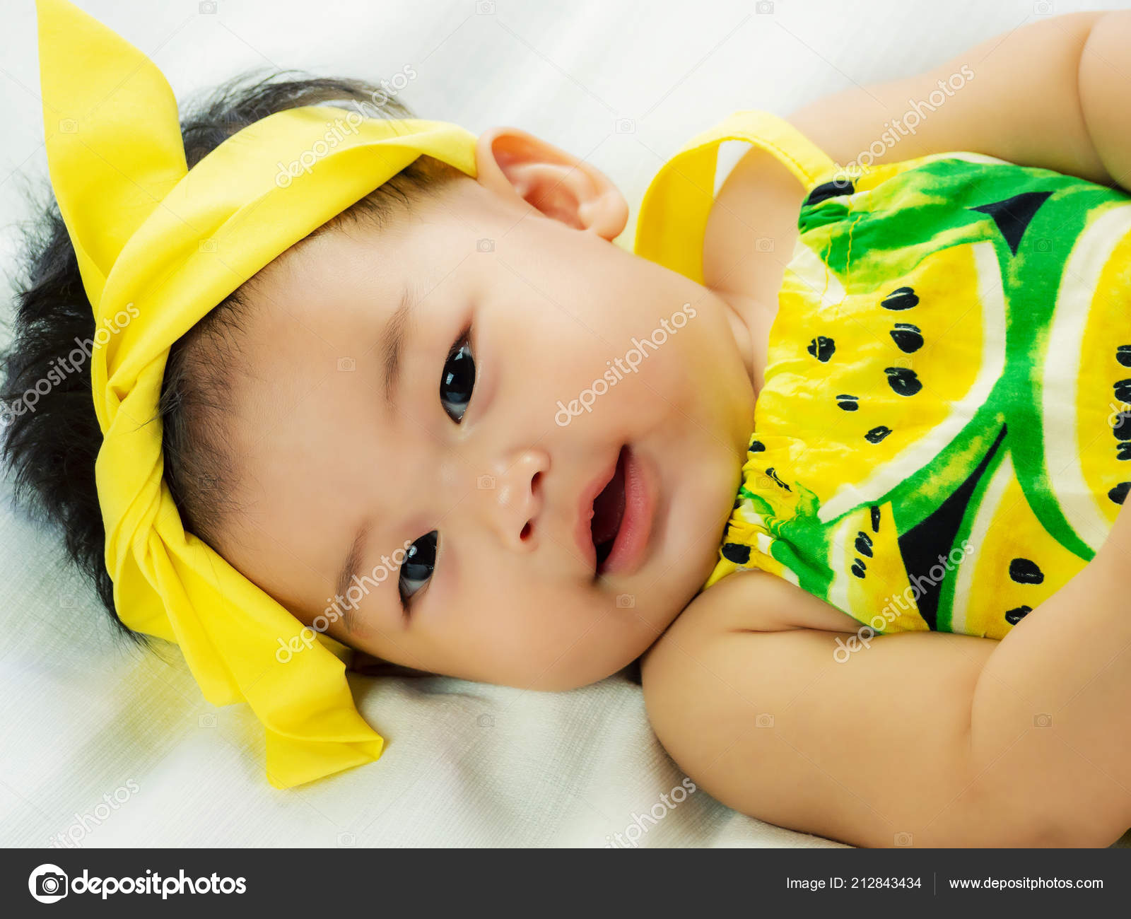 Portrait Cute Short Hair Asia Baby Girl Relaxing Smiling Lying