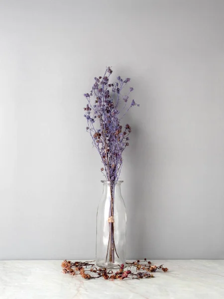 Bouquet Dried Wilted Purple Gypsophila Flowers Glass Bottle Matt Marble — Stock Photo, Image