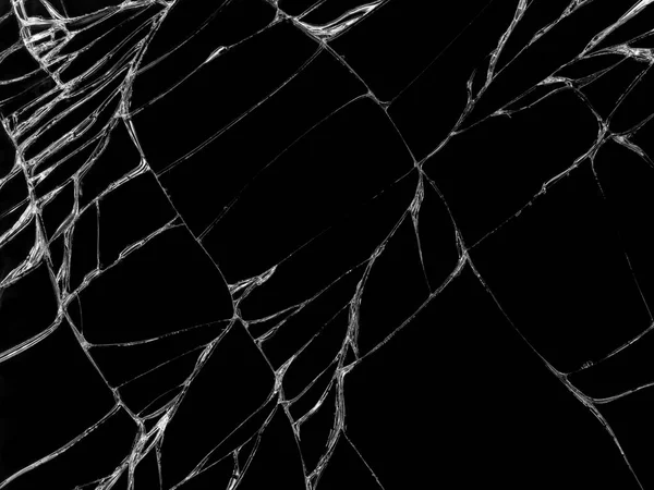 Cracked glass texture on black background. Isolated realistic cracked glass effect.