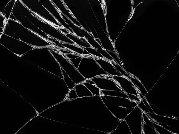 Cracked glass texture on black background. Isolated realistic cracked glass effect.