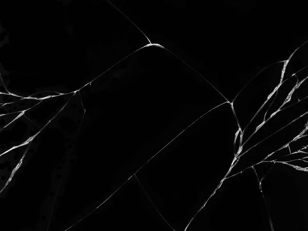 Cracked glass texture on black background