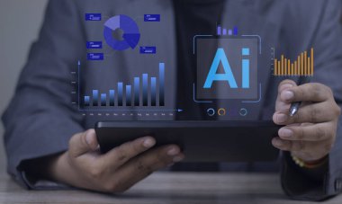 Businessman using a tablet with a futuristic interface, analyzing business data with AI technology. Financial charts and graphs on a virtual screen show growth and performance.