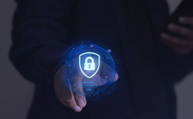 Businessman touching a virtual globe interface with a shield and padlock icon for cybersecurity. Concept of global data protection, secure network login, and internet privacy technology.