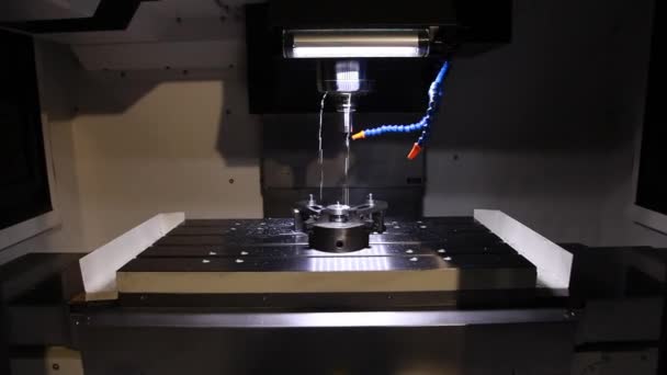 CNC milling machine in operation high-tech machine lathe metal processing — Stockvideo