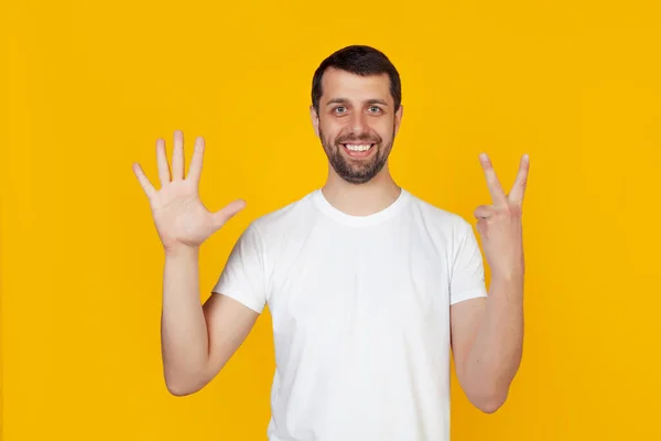 Modern Young Man Beard White Tank Top Shows Number Seven — Stock Photo, Image