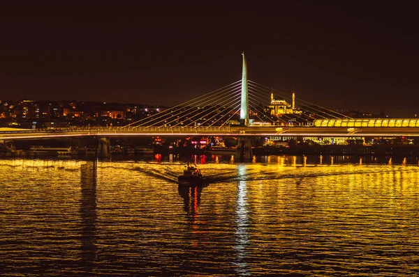 Night view to Golden Horn bridge, from Galata bridge, Istanbul, Turkey