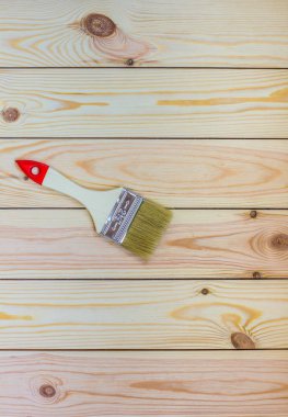 kahverengi ahşap masa arka plan üzerinde yeni boya fırçası