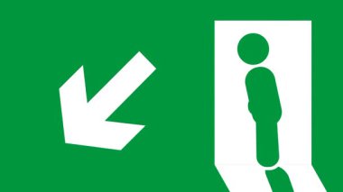 Bir acil çıkış işareti, sağa doğru yürüyen bir figür, belirlenmiş kaçış rotasını ve güvenlik talimatlarını simgeliyor.