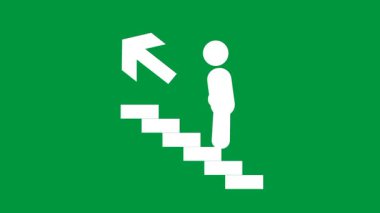 Acil durum tahliyeleri sırasında yukarı çıkan güvenli çıkış yolunu gösteren yeşil bir güvenlik işareti var.