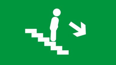 Acil durumlar için alt katlarda güvenli bir tahliye rotasını gösteren yeşil bir acil durum işareti var.