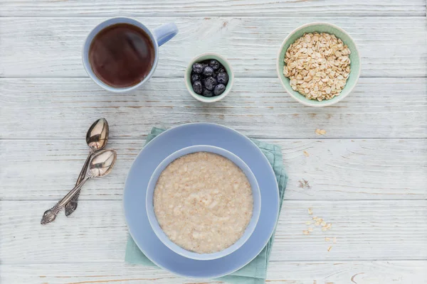 Oatmeal Porridge Bowl Berry Black Tea White Wooden Background Healthy — Stock Photo, Image