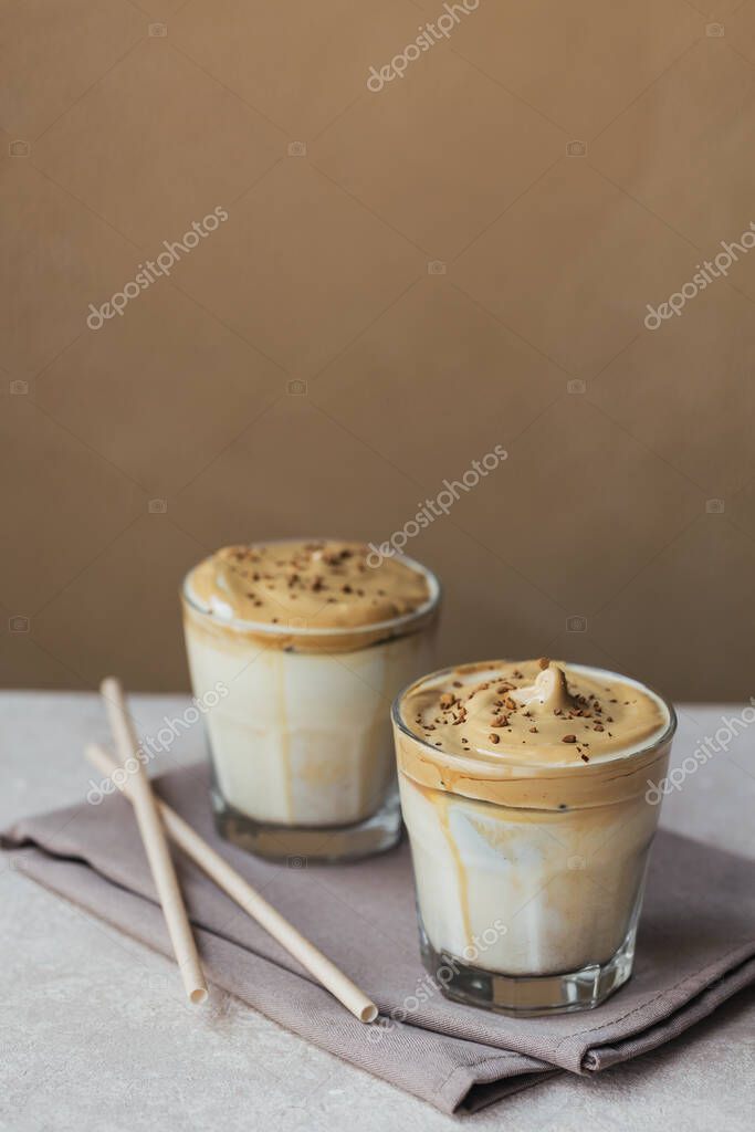 Download Dalgona Whipped Coffee Instant Cream Iced Coffee Cocktail With Coffee Milk And Ice Cubes On Light Beige Background Mock Up Trendy Drink Background With Copy Space For Text 390376990 Larastock
