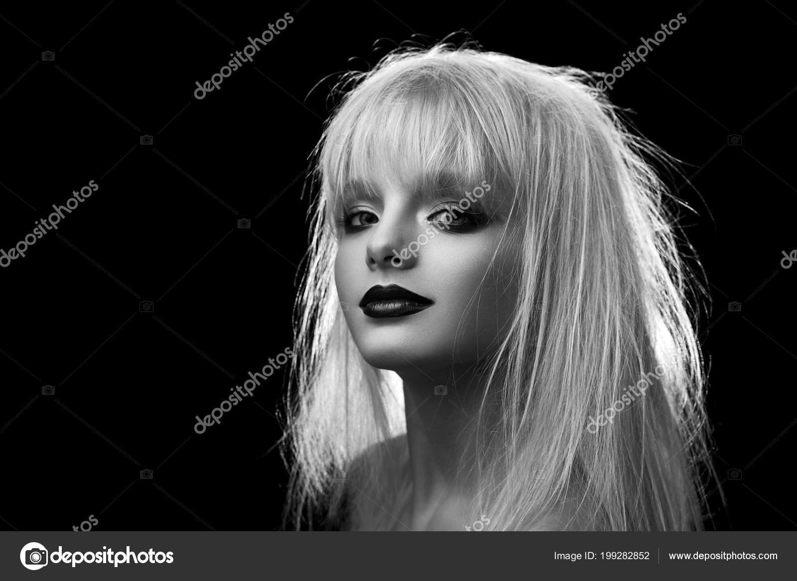 Black And White Photo Of Model With Blonde Dishevelled Hair
