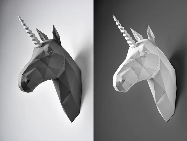 Two black and white unicorn heads on contrast background.