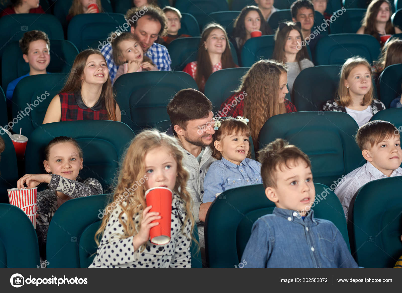 Parents And Children Watching Film In Cinema And Entertaining Stock Photo Image By C Serhii Bobyk Gmail Com