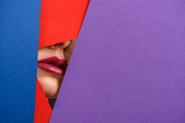 Photo of models lips surrounded by contrast carton sheets. — Stock Photo, Image