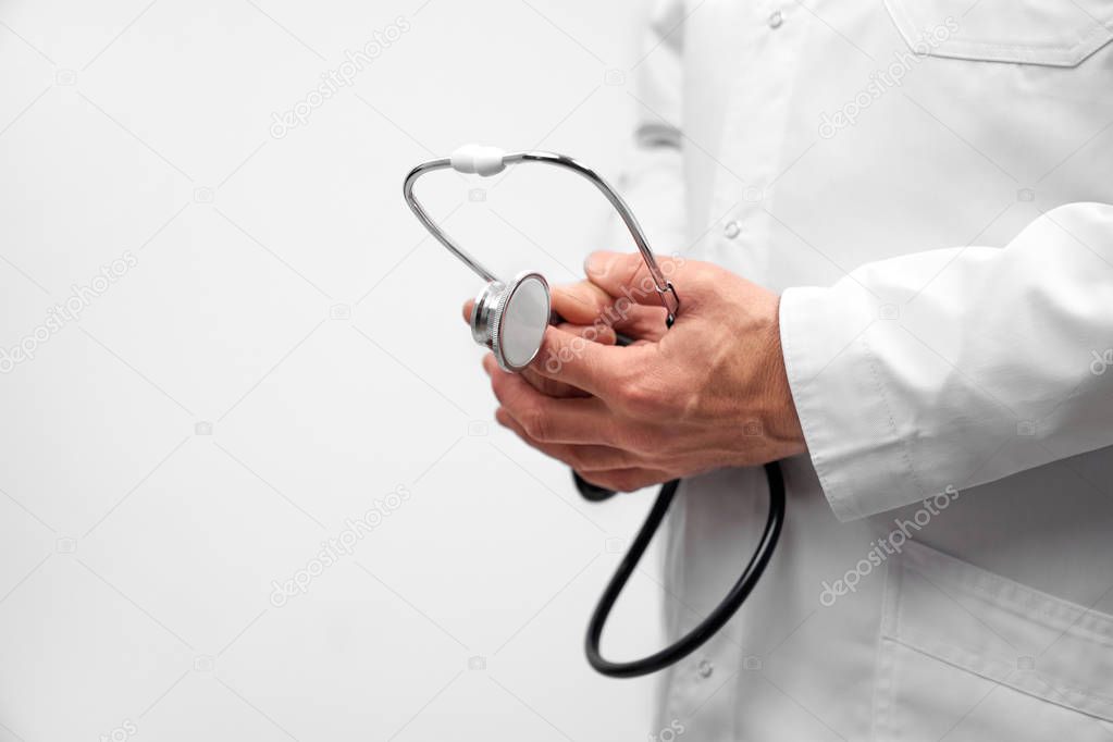 ENT doctor holding stethoscope.