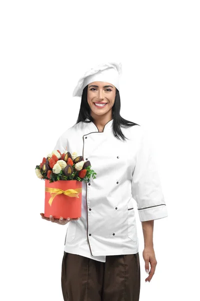 Girl holding box filled with strawberries in chocolate. — Stock Photo, Image