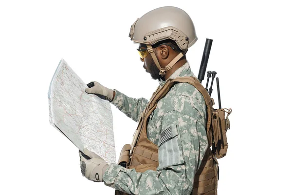 Soldier exploring terrain by map. — Stock Photo, Image