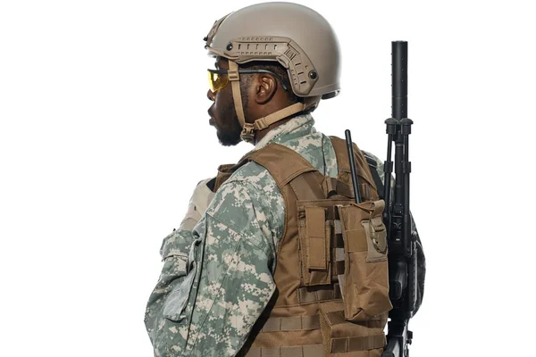 Professional soldier with backpack and radio installation. — Stock Photo, Image
