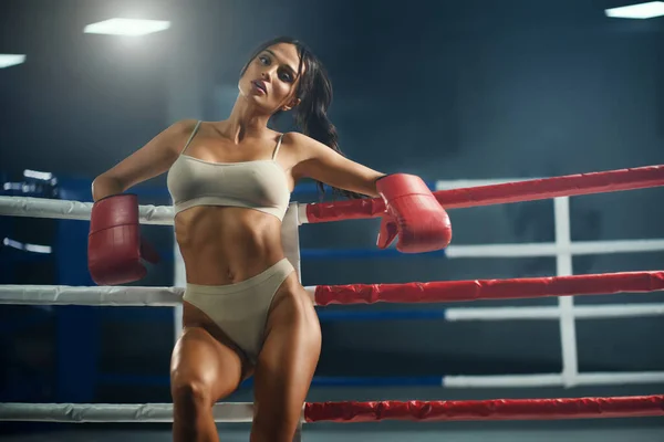 Female fighter in underwear posing near ring. — Stock Photo, Image