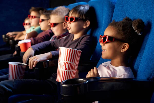 African girl wearing 3d eyeglasses in cinema. — Stock Photo, Image