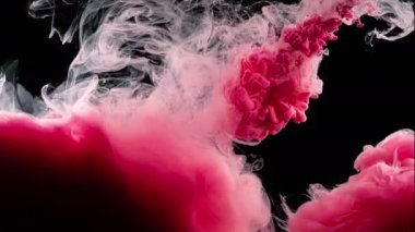 Suda mürekkep. Hareketi Durdur. Renkler: pembe, sarı, mavi, beyaz, kırmızı, yeşil. 
