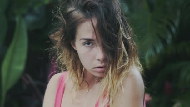 Close Up Of The Face Of A Young Girl With Short Ombre Hair Looks