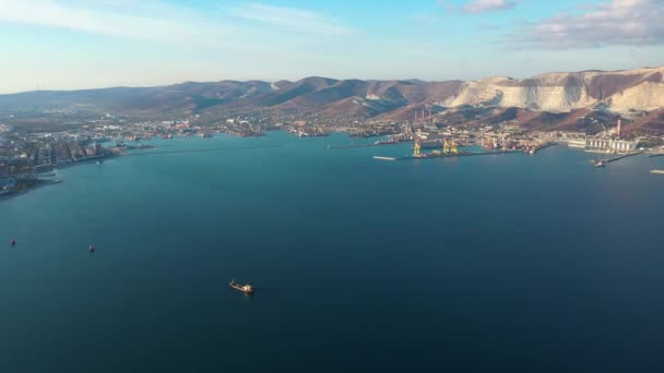 Aerial view on sea trade port, cove, transport city, sea and mountains — Stock Video