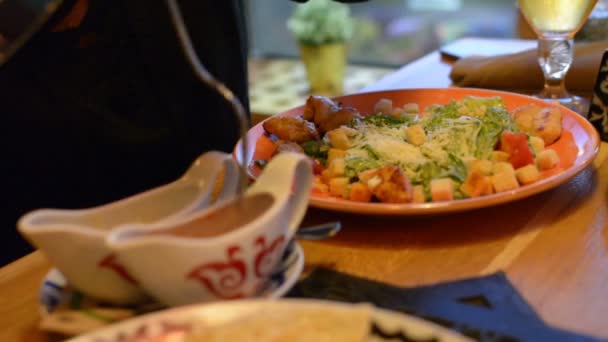 Macro Closeup Caesar Salad Plate Red Tongs Parmesan Cheese Dressing — Stock Video