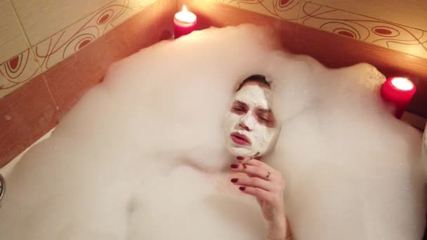 Girl Clay Mask Face Smoking Smokes Cigarettes Bathroom Filled Foam — Stock Video