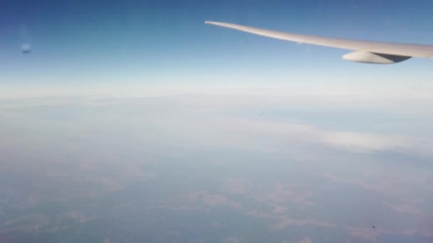 Kıtalararası uçak porthole'dan görünüm — Stok video