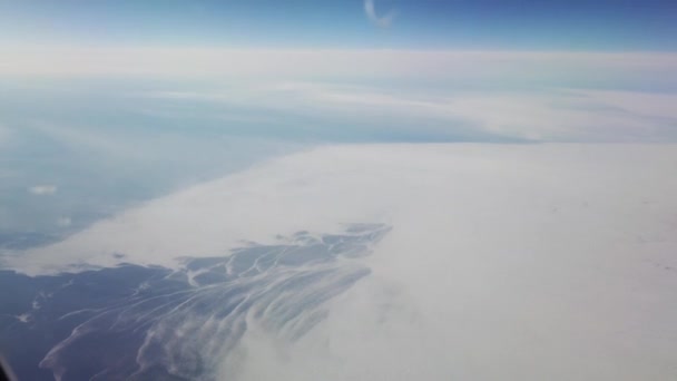 Kıtalararası uçak porthole'dan görünüm — Stok video