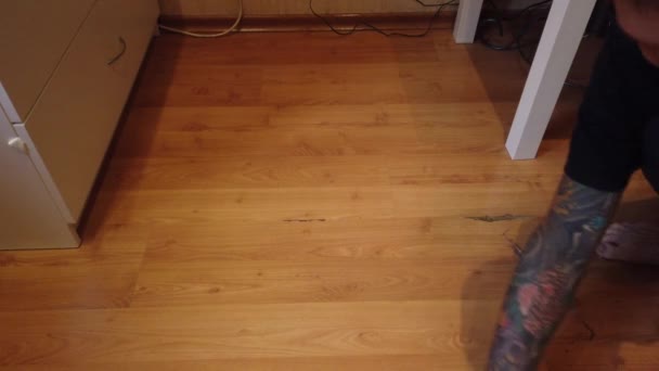 Young Man Washing Floor Home Closeup Man Wiping Dirt Wooden — Stock Video