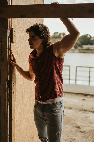Handsome Muscular Man Sleeveless Shirt Standing Doorway Stormy Weather — Stock Photo, Image