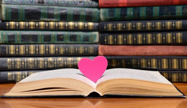 Pink Heart Lies Pages Open Book Yea Background Piles Old — Stock Photo, Image