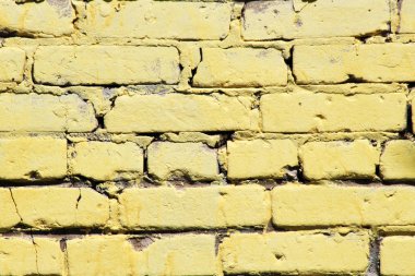 arka plan olarak retro Sarı tuğla duvar boyalı