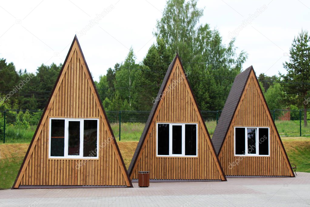 Triangular wooden houses for rest, outdoor objects