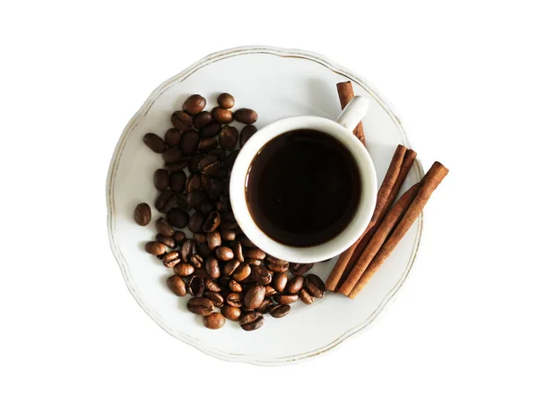 Taza de café y granos de café sobre fondo de madera. Vista superior aislada sobre fondo blanco . — Foto de Stock
