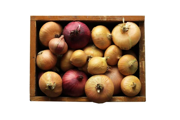 Fresh onions in a wooden box isolated on white background — Stock Photo, Image