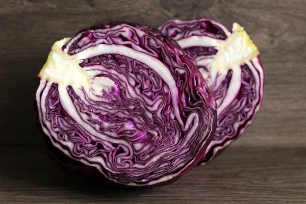 Red cabbage on wooden background