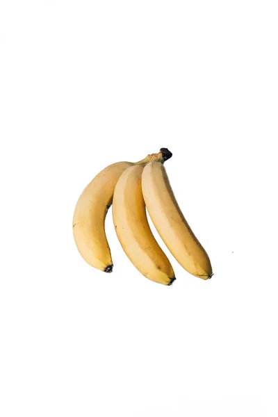 白色背景下的香蕉 黄色产品 长方形的水果 有用的水果 素食主义者 素食者 水果在白色背景为菜单 — 图库照片