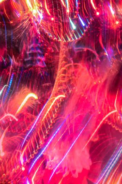 Yumuşak ufuk kırmızı tatil arka plan ışık. Sevgiliye arka plan defocused. Hareket bulanıklığı arka plan