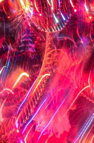 Yumuşak ufuk kırmızı tatil arka plan ışık. Sevgiliye arka plan defocused. Hareket bulanıklığı arka plan